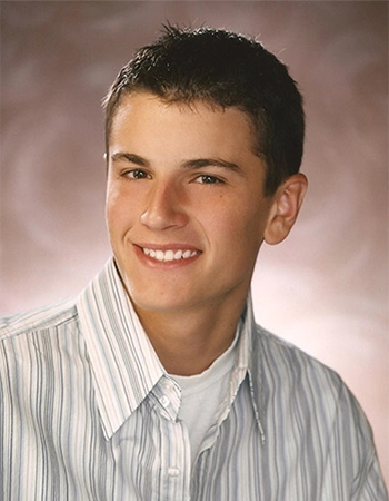 Young Boy In Collared Shirt Smiling After Orthodontic Treatment At Walker & Wright Orthodontics - Freeport