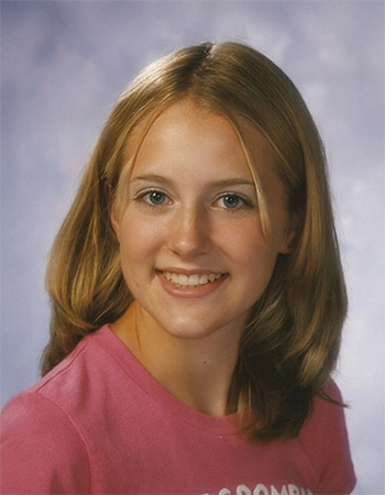 Young Girl In Pink Shirt Smiling After Orthodontic Treatment At Walker & Wright Orthodontics - Monroe